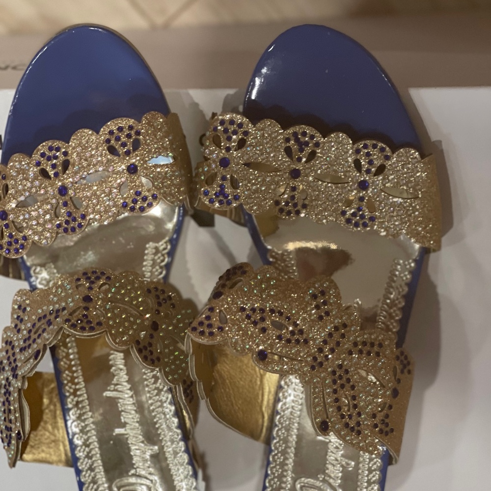 Blue and gold rhinestones shoe with gold block heel. Size 9